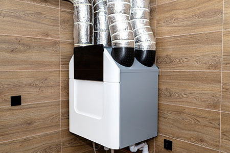Home,mechanical,ventilation,with,heat,recovery,hanging,on,the,wall